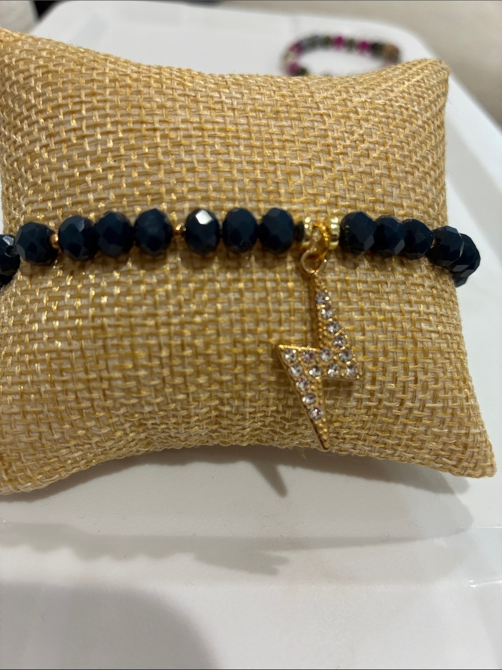 Gold Lightning Charm Black Bead Stretch Bracelet